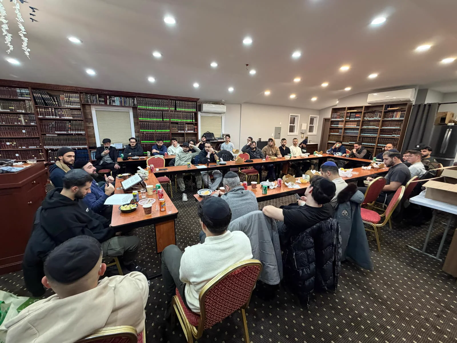 A full room gathered for Torah and connection